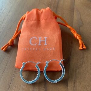 NEW 🎀 Silver plated w/clear CZ stones. 3/4” hoops. CH stamped. Storage bag.